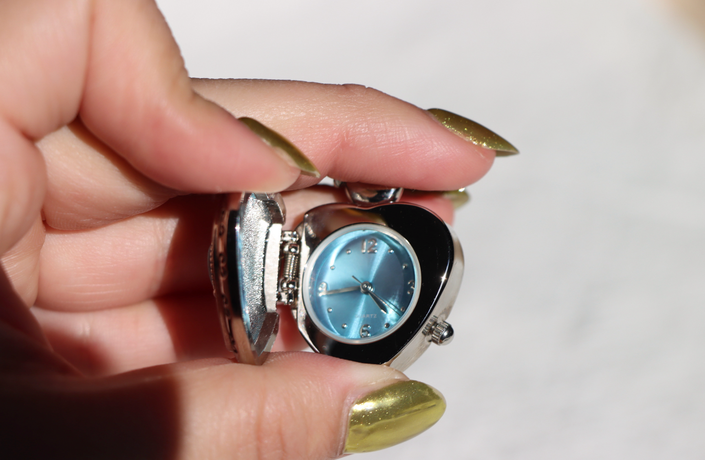 Avon Blue heart Charm/Locket with Watch Inside