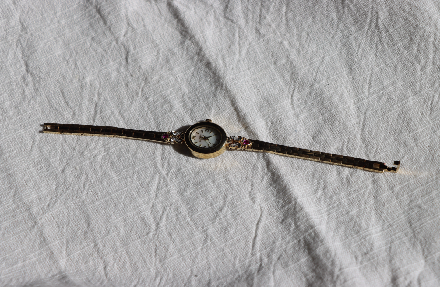 Elgin Gold Tone Vintage Watch with Ruby Accents