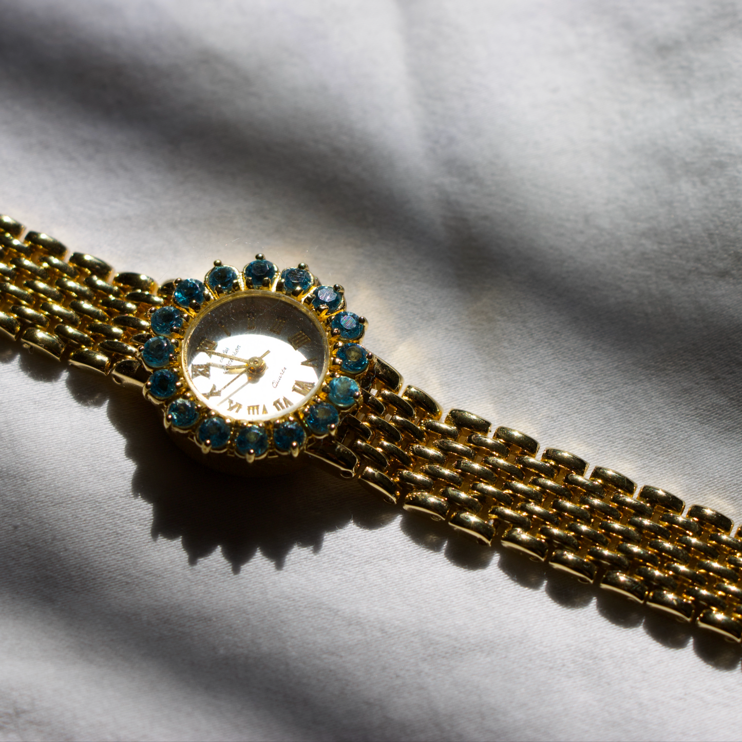 Jules Jurgenson Blue Topaz Bezel Watch