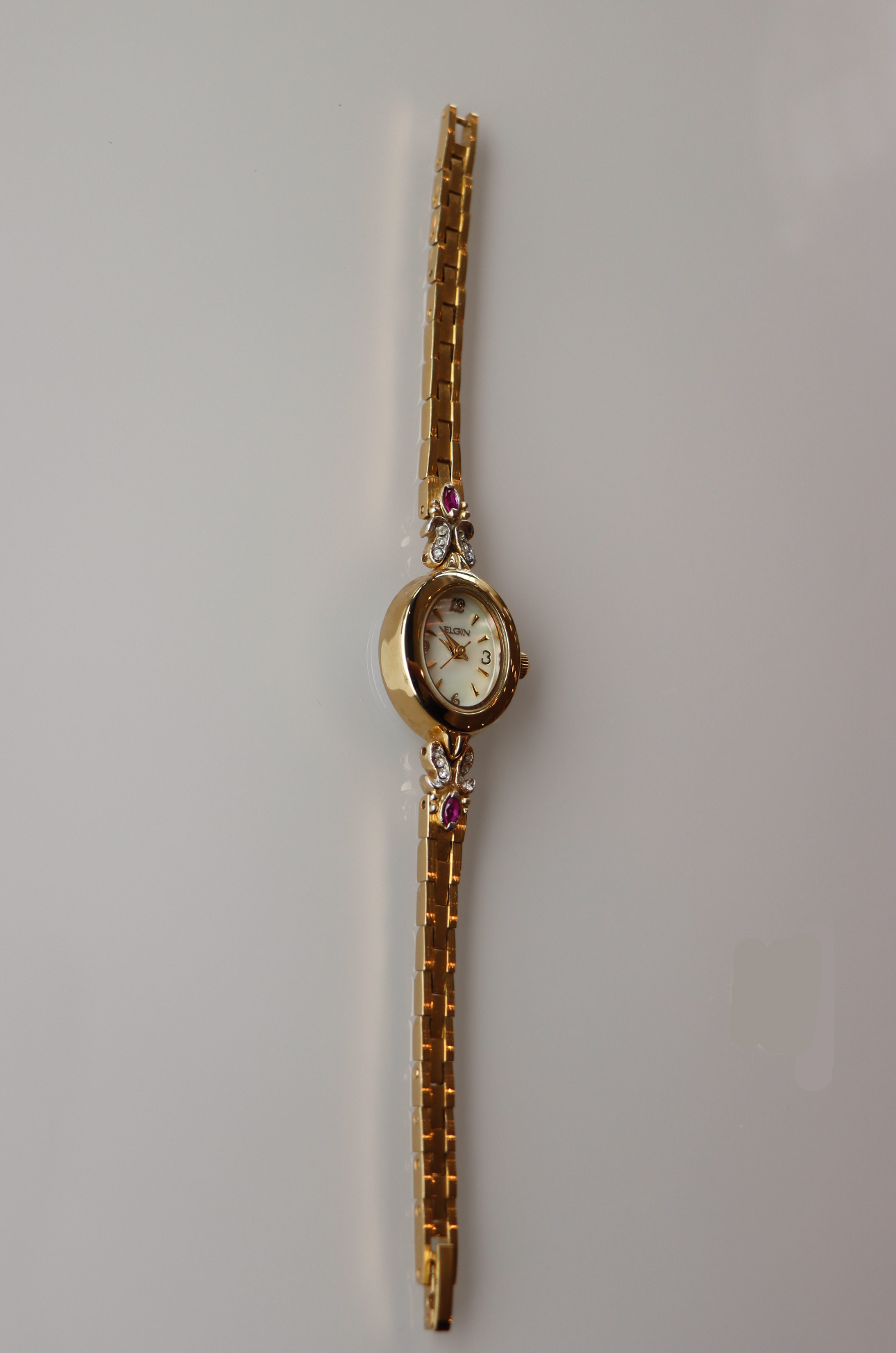 Elgin Gold Tone Vintage Watch with Ruby Accents