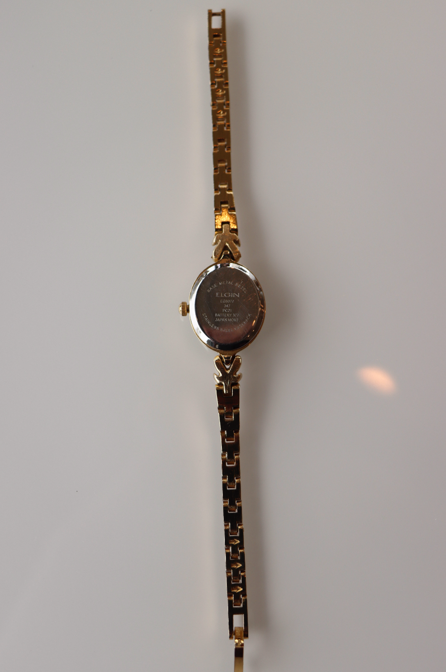 Elgin Gold Tone Vintage Watch with Ruby Accents